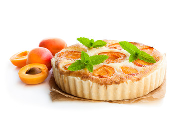 Homemade  cheese cake with apricot isolated on white