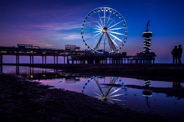 feeris wheel at sunset in the netherlands