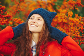 Model wearing stylish winter beanie hat and gloves