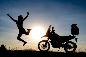 Fototapeta na wymiar happy and cheerful motorcyclist