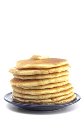 Stack of Freshly Made American Style Pancakes with Metling Butter