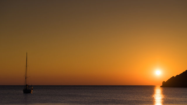 Fototapeta Yacht on sea water surface