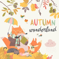 Red fox father and son reading a book