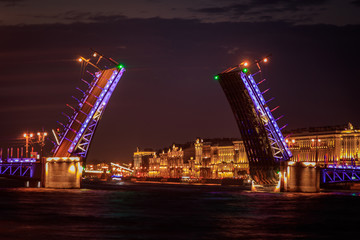 Fototapeta na wymiar Divorce of bridges in St. Petersburg. Night city of Russia. The Neva River