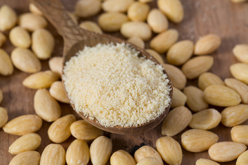 almond flour in a wooden spoon