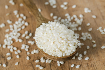 round rice on a wooden surface