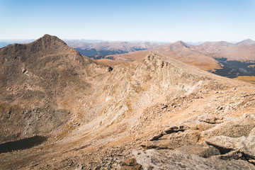 Fototapeta na wymiar Landscape view of the Rocky Mountains from the top of Mount Evans in Colorado. 