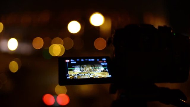 Coliseum at Night. Girls Korean, Japanese, Chinese browse photos at camera