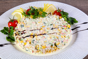Salad with crab surimi