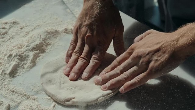 flying pizza dough with flour scattering pinsa pinza chef restaurant cafe