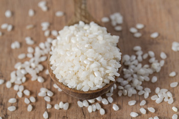 round rice on a wooden surface
