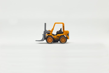 Orange toy construction machine