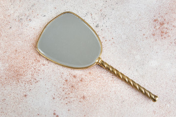Vintage brass hand mirror