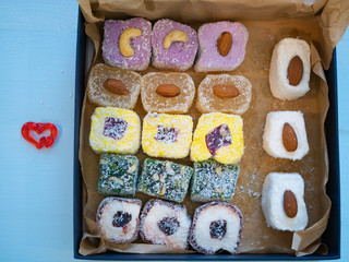box of turkish delights with heart sign amulet aside