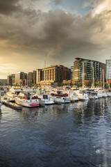 Fototapeta na wymiar Hotels and restaurants on the harbour marina wharf district in Washington DC USA