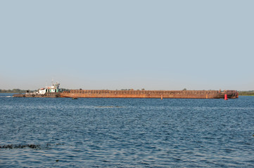 Container ship in export and import business and logistics. Shipping cargo to harbor by crane....
