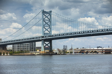 Fototapeta na wymiar Benjamin Franklin Bridge over the Delaware River linking New Jersey to Pennsylvania USA