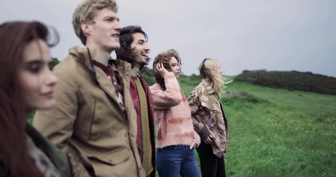 Millennials enjoying scenic view of landscape