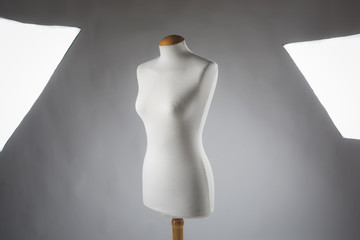 female mannequin and studio lights