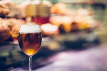 Glass of fresh and appetizing beer