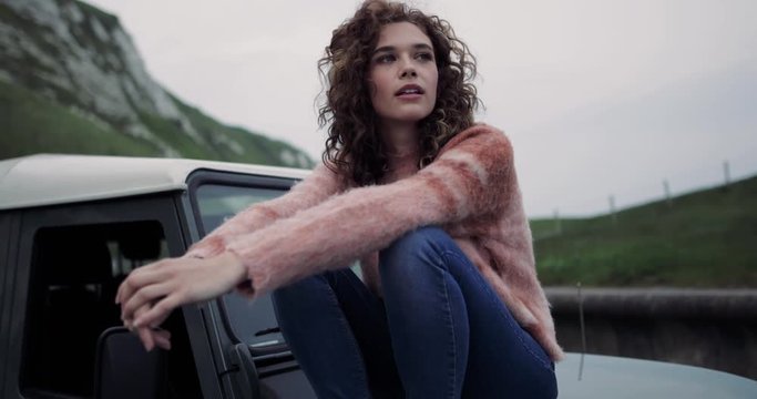 Millennial female on a winter road trip 