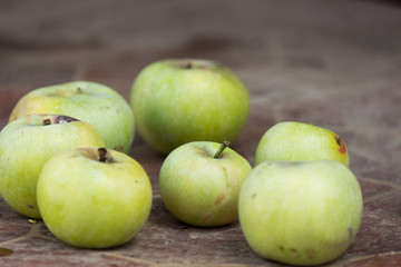 Juicy and delicious Apple lying on the table, fruit on the table. Apples on white background. apples lie on the table