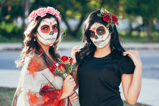Portrait of Calavera Catrina. Young women with sugar skull makeup. Dia de los muertos. Day of The Dead. Halloween.