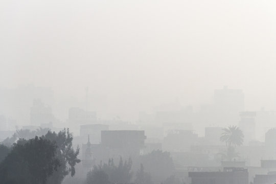 Cairo covered in smog, air pollution and low visibility.