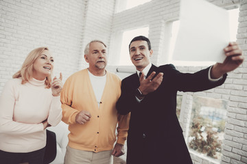 Old Man and Woman Visiting Young Lawyer in Office.