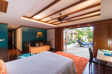 Luxury Interior design in bedroom of pool villa with cozy king bed.high raised ceiling , home, house