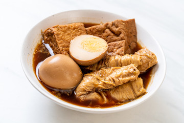 hard-boiled egg in brown sauce or sweet gravy