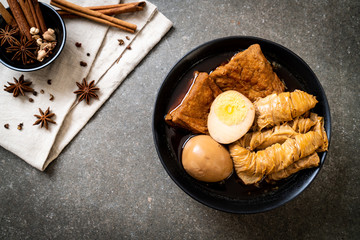 hard-boiled egg in brown sauce or sweet gravy