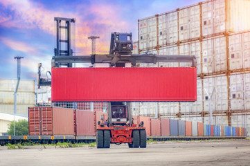 Forklift handling container box loading in the port.