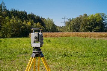 Surveying High Voltage Power Lines - Total Station in the Field © Dietmar