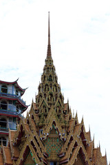 Fototapeta premium The pagoda with the temple roof in Thailand.