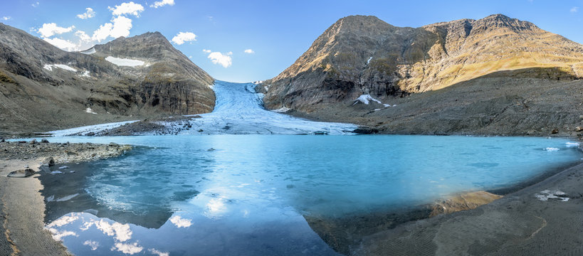 Climate change banner - panorama view of melting glacier. Steindalsbreen glacier - Norway
