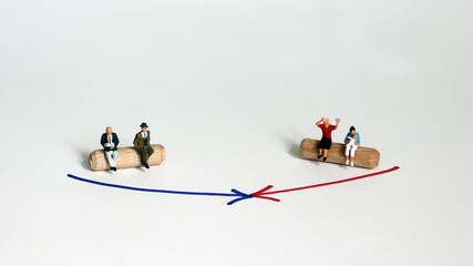 Miniature men and miniature women. The concept of male and female character typically demanded by...