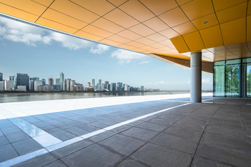 Panoramic skyline and buildings with empty square floor