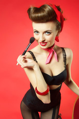 portrait of pin up girl on red background
