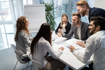 Business people working together on project and brainstorming in office