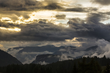 Dramatic clouds at sunset and beautiful light in the Dolomite Alps