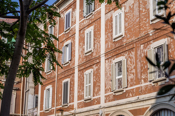 Fototapeta na wymiar Apartment buildings in historic neighborhood of Milan, Italy