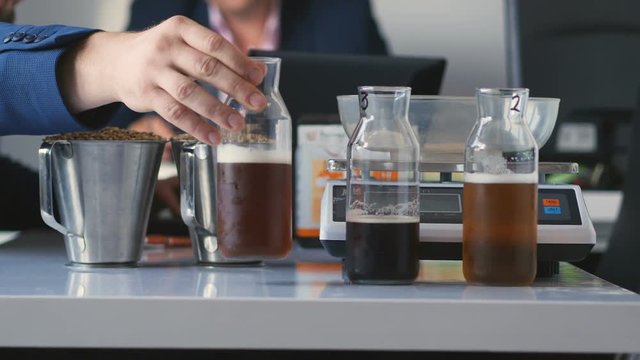 Specialists testing beer quality in lab