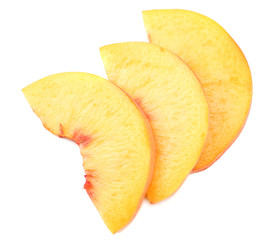 peach fruit slices isolated on white background. top view