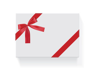 rectangular white box with a red bow 