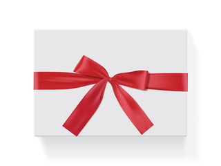 rectangular white box with a red bow 