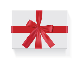 rectangular white box with a red bow
