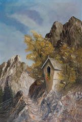 Eine Bildstock in den Bergen zwischen zwei Bäumen