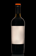 Bottle of red wine with white label