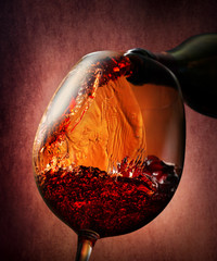 Wine on a burgundy background